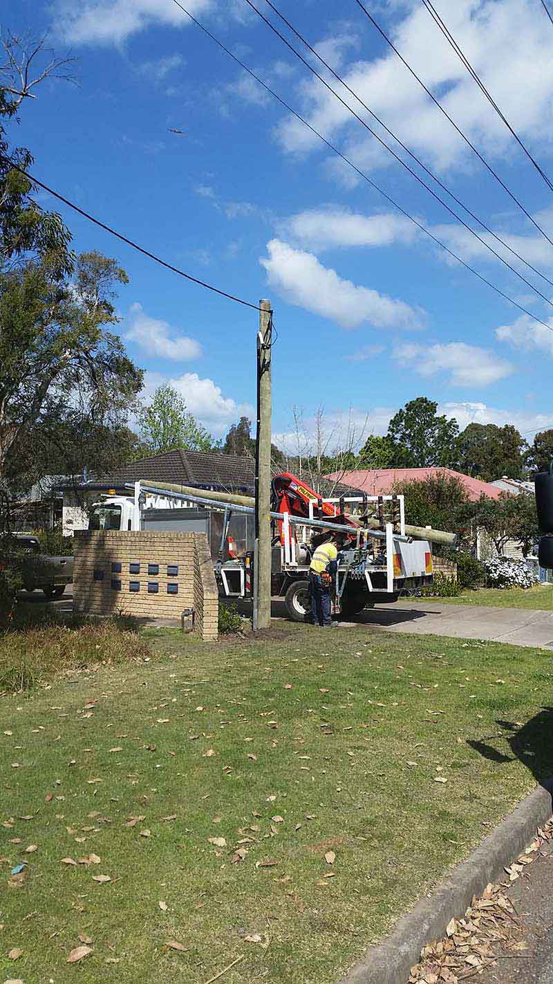 Power pole installation by Eris